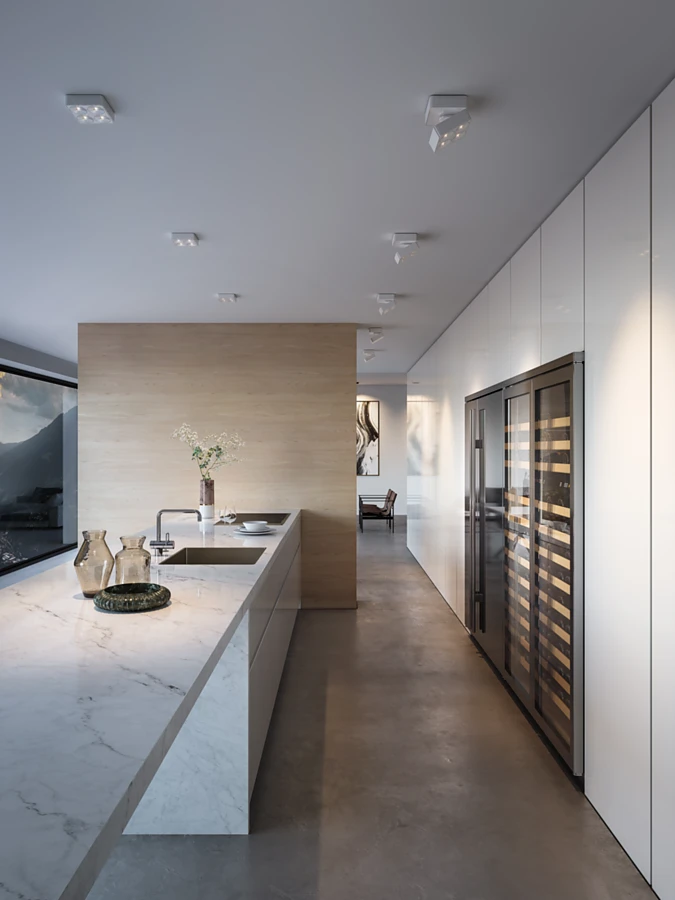 High-quality, consistent lighting with directed light and pinpoint accentuating light. Q Four illuminates the worktop in an open kitchen; the Q Four TT spotlight accentuates the wall. Kitchen and living space flow into one another, ideally calling for consistent lighting design. Photo: DesignRaum